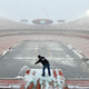 Clearing snow ahead of the Kansas Chiefs playoff game last weekend. The coming weekend’s game promises to be even colder.